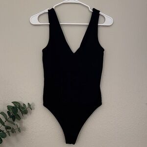 Vuori women’s v-neck one piece black bodysuit